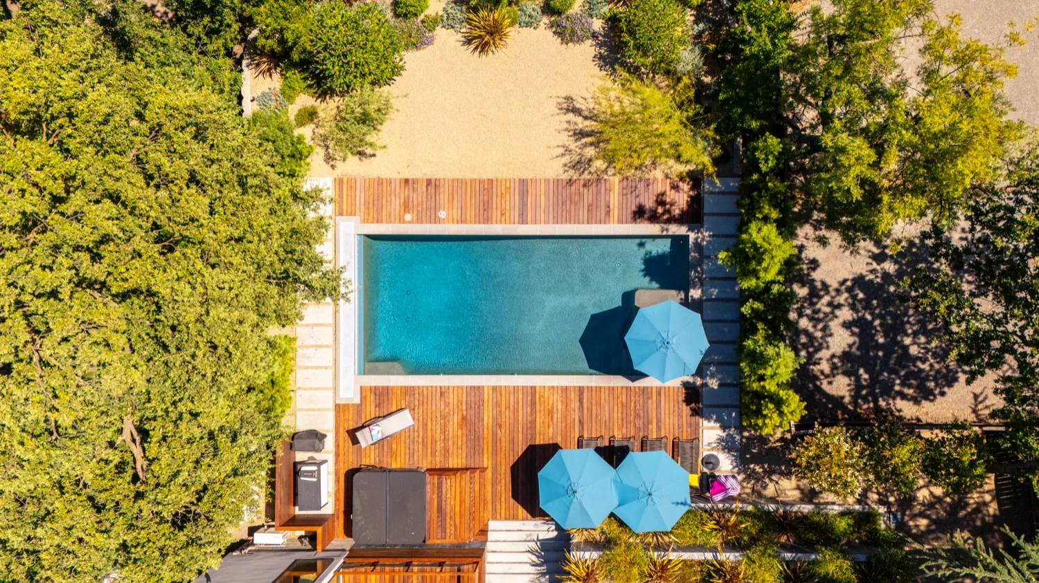 Integrated spa alongside the San Miguel custom pool